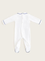 Little Collins Clothing white babygrow with smocking, peter pan collar and blue anchors back view of buttons