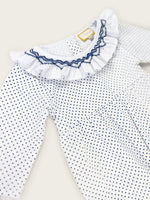 Little Collins Clothing Navy Polkadot Babygrow with frilled, hand smocked collar close up view