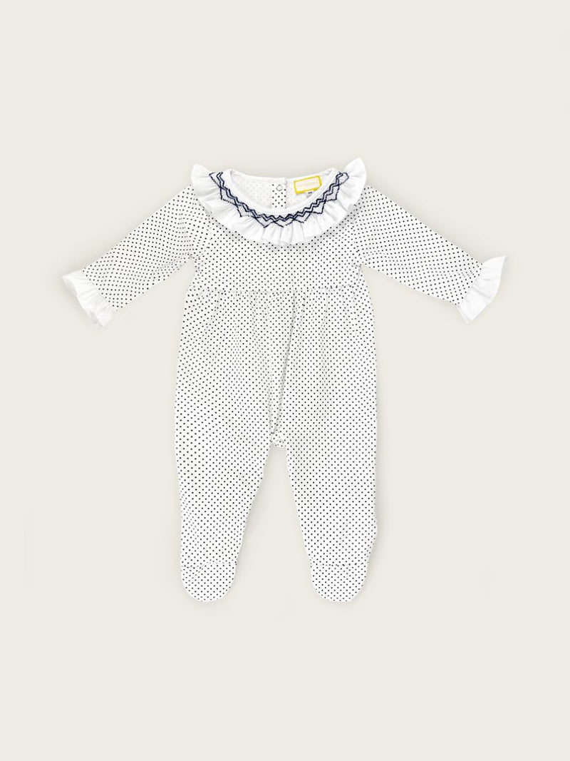 Little Collins Clothing Navy Polkadot Babygrow with frilled, hand smocked collar front view