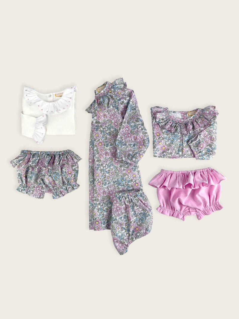 The complete floral set of dresses, bloomers, and blouses from Little Collins Clothing.