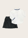 Girls white blouse with blue grosgrain ribbon collar paired with French Navy Check skirt rear view